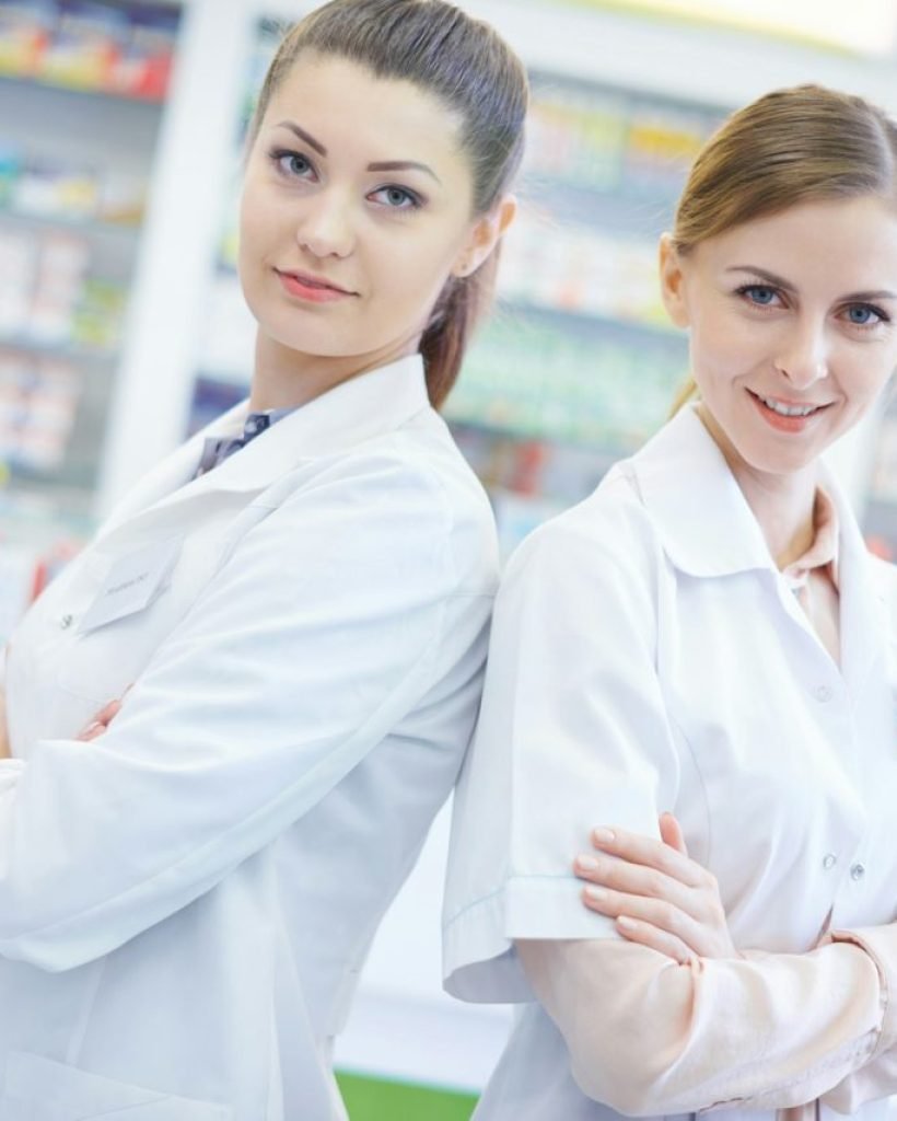 two-attractive-pharmacists-in-pharmacy.jpg